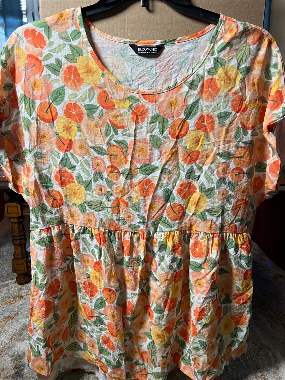 BloomChic Orange and Yellow Floral Peplum Short-Sleeve Top
